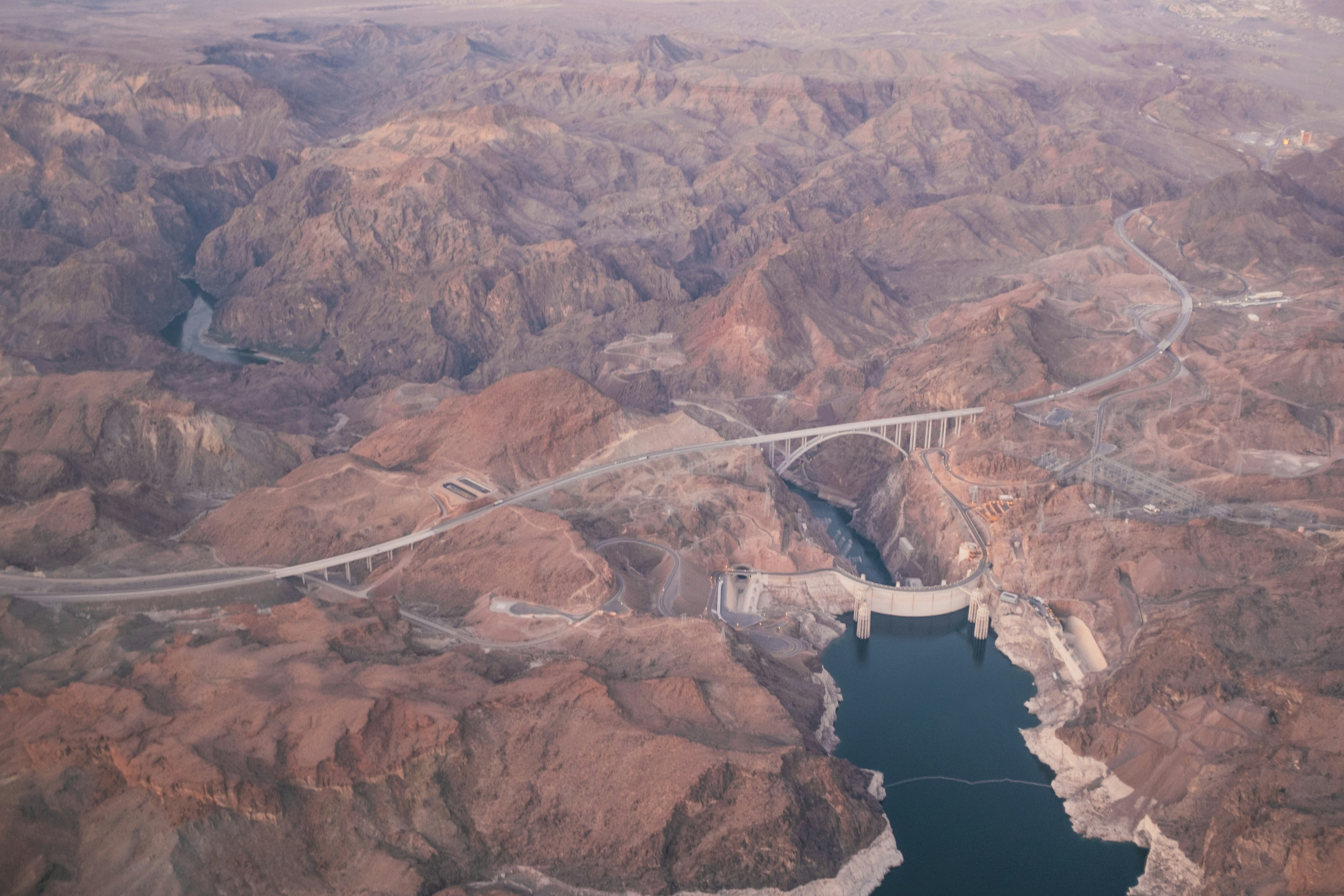 areal photo of bridge near body of water